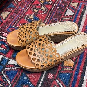 A Tory Burch Tan wedge pair of sandals size 9